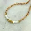 collier en perles heishi de coquillage, en perle rhodochrosite , hématite et perles dorées à l'or fin 24 carats