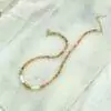 collier en perles heishi de coquillage, en perle rhodochrosite , hématite et perles dorées à l'or fin 24 carats
