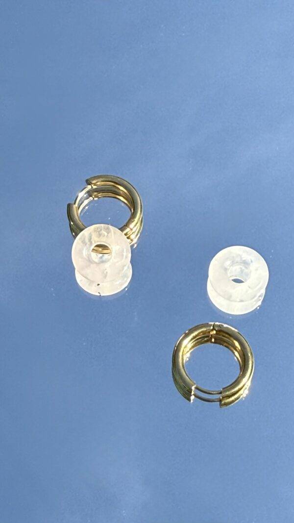 Boucles d'oreilles dorées donut pierre de lune blanche
