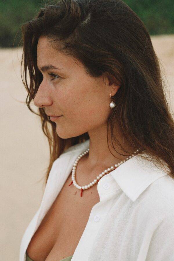Collier de perles et piments et boucles d'oreille en perles